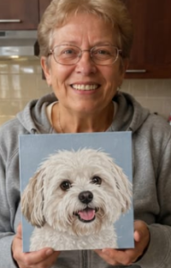 Mujer anciana con un cuadro de su mascota